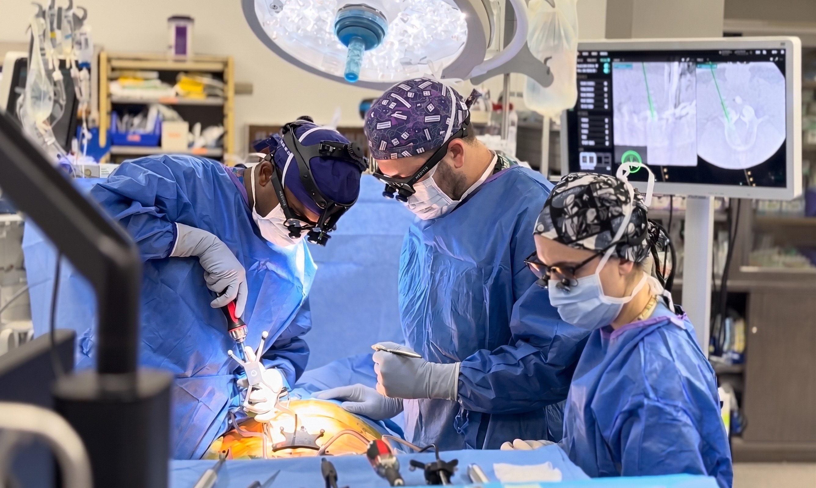 Surgeon wearing the smart glasses fitted with loupes